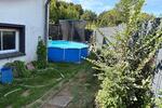 Freistehendes Einfamilienhaus mit großem Grundstück, 3 Garagen.