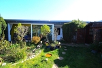 Gepflegter Flachdach-Bungalow auf traumhaftem Sonnengrundstück in begehrter Lage von Köln Lindweiler