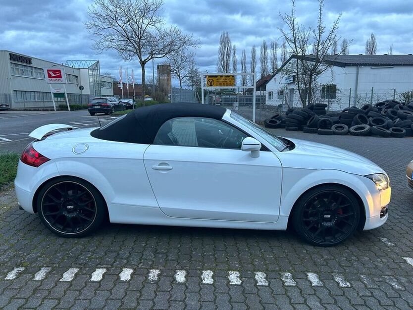 TT