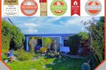 Gepflegter Flachdach-Bungalow auf traumhaftem Sonnengrundstück in begehrter Lage von Köln Lindweiler