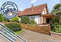 Ansprechendes Wohngebiet in Ringen: Einfamilienhaus mit Garten und Garage
