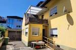 7-ZimmerHAUS MIT 3 BÄDERN, 2 GARAGEN UND GROSSEM GARTEN IN GUTER, ZENTRUMSNAHER WOHNLAGE!