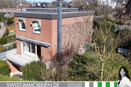 Kleines Haus mit zwei Garagen für kleine Familie in bevorzugter Wohnlage von Swisttal-Heimerzheim