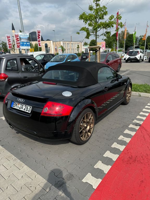 TT